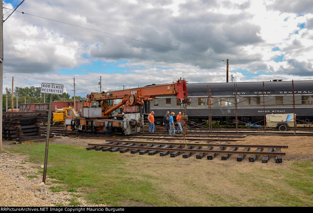 Amtrak Burro Crane Model 50 laying track